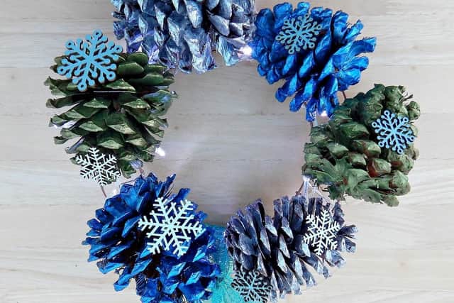 The homemade pinecone wreath