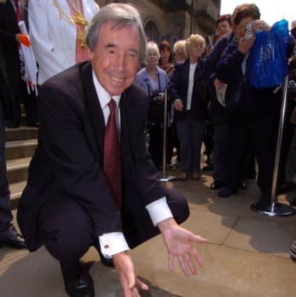 World cup-winning goalkeeper Gordon Banks  after unveiling his Sheffield Legends plaque set in the pavement outside the Town Hall Shefield in 2006.