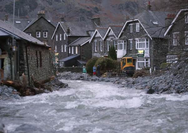 Glenridding after the river in the town in Cumbria burst its banks again following continued rainfall last night.