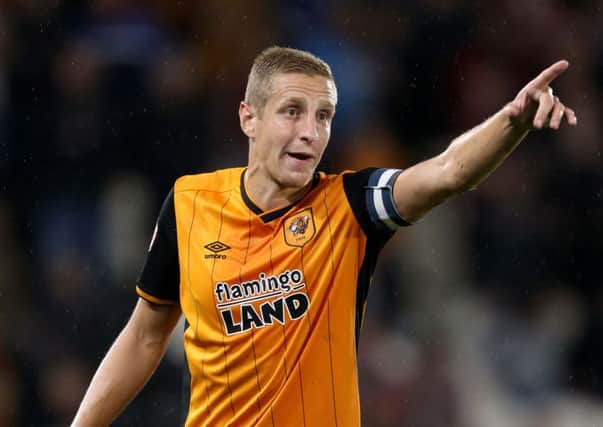 Hull City defender Michael Dawson is back in the fray as they aim to bounce back against crisis club Bolton Wanderers (Picture: PA).