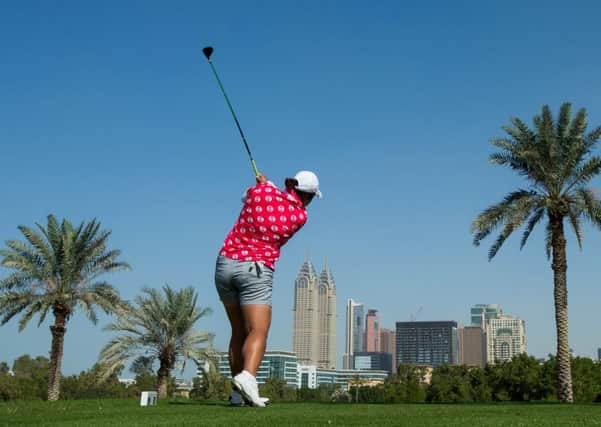 Leader Shanshan Feng of China plays her tee shot at the second during the third round of the Omega Dubai Ladies Masters at Emirates GC (Picture: Tristan Jones).
