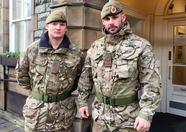 Corporals Aaron Kelly (left) and James Butler of the 2nd Battalion Duke of Lancaster's Regiment, who have been in Keswick, Cumbria with 100 other army personnel knocking on doors ensuring people are safe and offering help. Communities in flood-hit areas are gearing up for a second weekend of wet weather. The Environment Agency said it was checking the condition of flood defences and the position of pumps and temporary flood barriers, ahead of a predicted 2.5in of rain on Saturday.