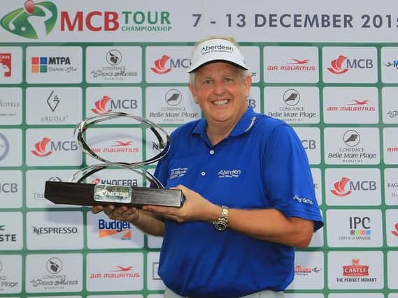 Colin Montgomerie pictured with the MCB Tour Championship trophy (Picture: Getty Images).