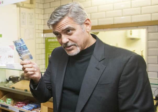 Actor George Clooney visiting Social Bite sandwich shop in Edinburgh