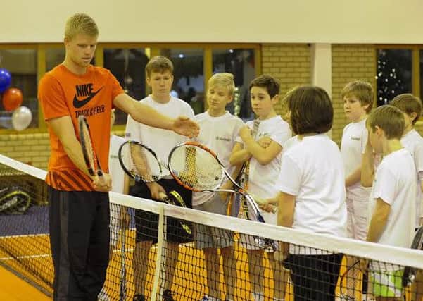 Kyle Edmund visiting the David Lloyd tennis school fresh from his Davis Cup victory.  (Picture: Darren Casey / DCimaging.co.uk)