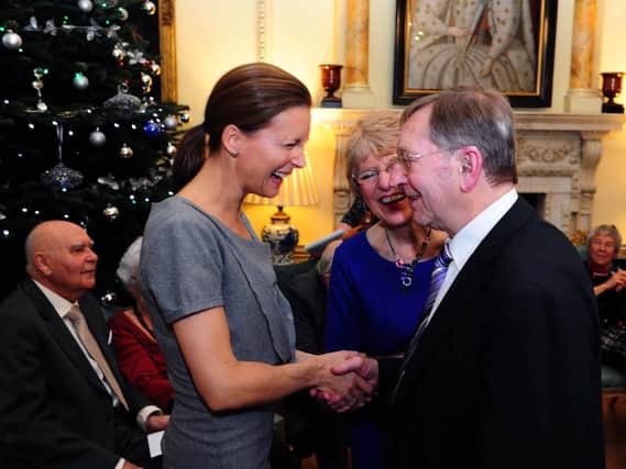 Brian and Phyllis Wilkinson from the Barnsley Rockley Tea Parties meet Strictly Come Dancing's Katie Derham, at Number 10 Downing Street during the Christmas party.