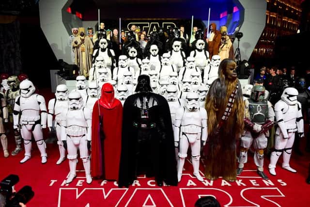 Actors in Star Wars character costumes attending the Star Wars: The Force Awakens European Premiere held in Leicester Square, London on Wednesday.