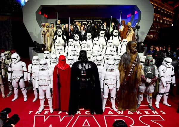 Actors in Star Wars character costumes attending the Star Wars: The Force Awakens European Premiere held in Leicester Square, London on Wednesday.