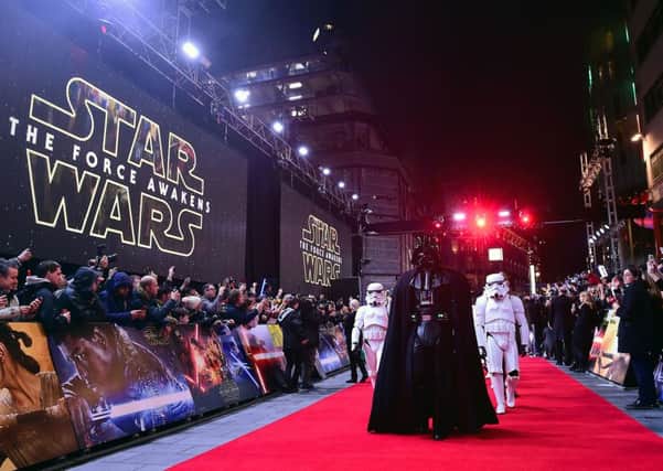 Darth Vader and Stormtroopers attending the Star Wars: The Force Awakens European Premiere held in Leicester Square, London.