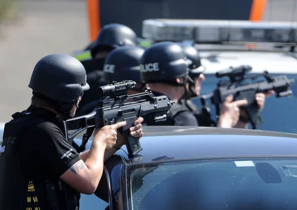 Armed police in Sheffield this summer