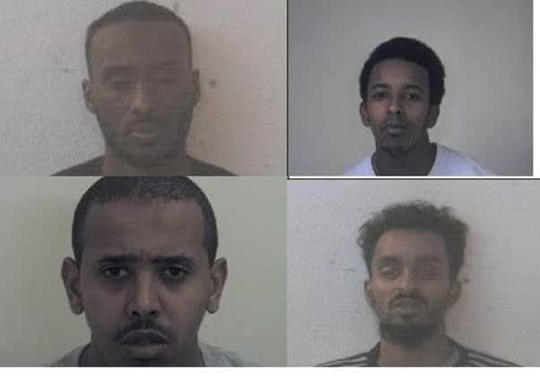 Men wanted by the police in connection to the Jordan Thomas murder