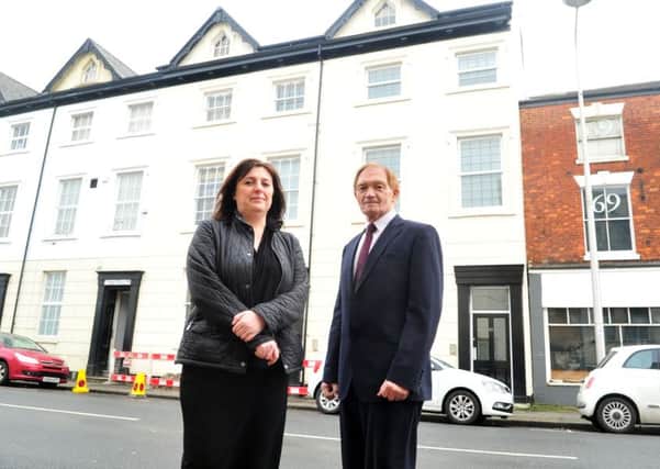 Two larder buildings on  Wright Street, Hull, have been transformed into affordable apartments.
Pictured are  Probe project manager Jayne Brindley with Coun John Black from Hull Council. Picture Tony Johnson