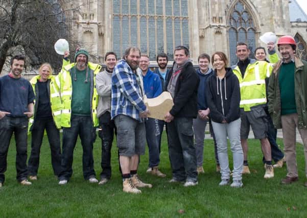 The final stone in the work to conserve and restore York Minsters East End has been fixed to the cathedral today.   Pic: Duncan Lomax, Ravage Productions.