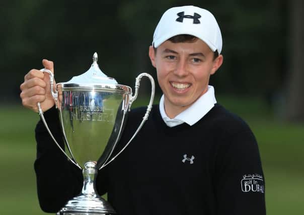 Hallamshire member Matt Fitzpatrick holds the British Masters trophy after his triumph at Woburn (Picture: Nigel Ffrench/PA).