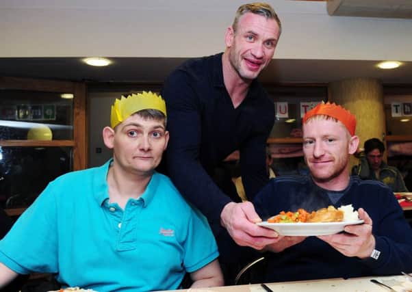 Christmas dinners are served to the homeless at St George's Crypt, as part of help-the-homeless day. Pictured former Leeds Rhinos player Jamie Peacock.
18th December 2015.
Picture : Jonathan Gawthorpe
