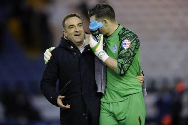 Sheffield Wednesday head coach Carlos Carvalhal with Kieren Westwood at the final whistle. Picture Steve Ellis.