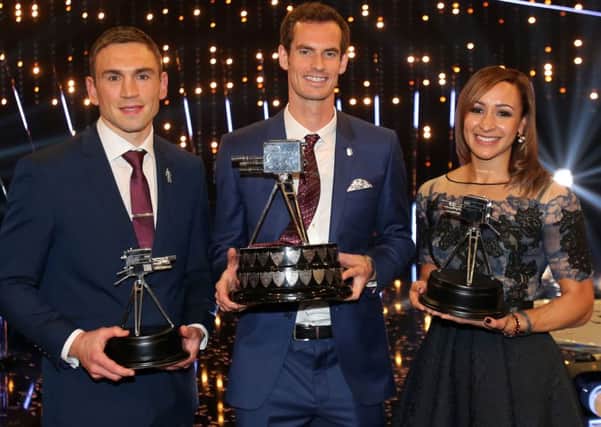 WHAT A GREAT TRY: Winner Andy Murray with Kevin Sinfield and Jessica Ennis-Hill, who pushed him close for the trophy, at the SSE Arena, Belfast. Pictures: PA.