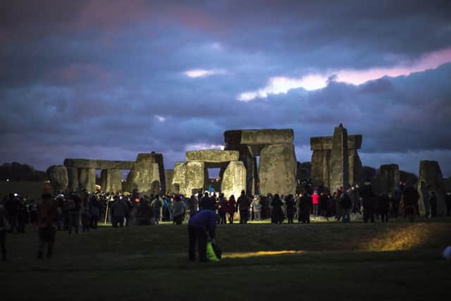 People enter the site at Stonehenge, Witshire, where people gather to celebrate the Winter solstice. (Picture: Ben Birchall/PA Wire)