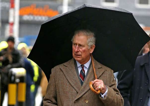 The Prince of Wales walks around the McVitie's factory in Carlisle, which was damaged in the floods earlier in the month. Photo: Peter Byrne/PA Wire