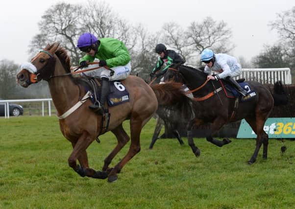 Dolatulo, left, on its way to winning the Rowland Meyrick Chase at Wetherby last year (Picture: Anna Gowthorpe/PA Wire).