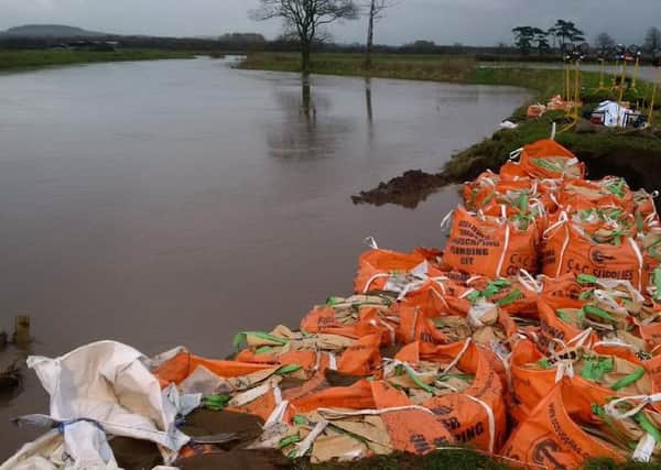 Sandbags were used to plug the holes in the flood defences.