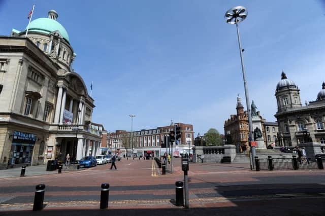 Hull city centre with the City Hall, left, and the Maritime Museum, right, in Queen Victoria Square. (PICTURE: TERRY CARROTT)