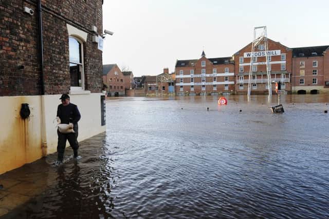 The River Ouse in York continues to rise, flooding riverside properties in the city centre