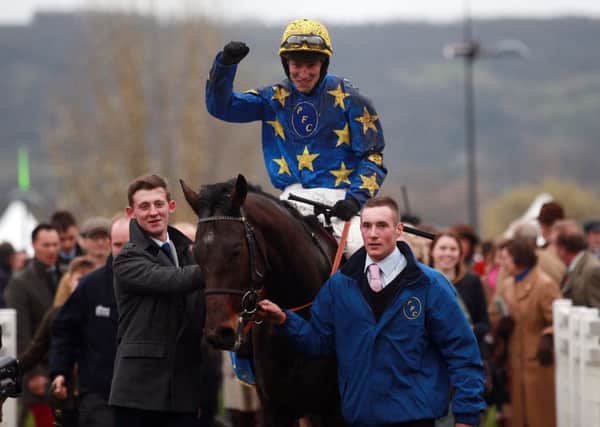 Jockey Ian Popham celebrates his victory aboard Annacotty, owned by Liz Prowting, in the Paddy Power Gold Cup Chase at Cheltenham last month (Picture: David Davies/PA Wire).