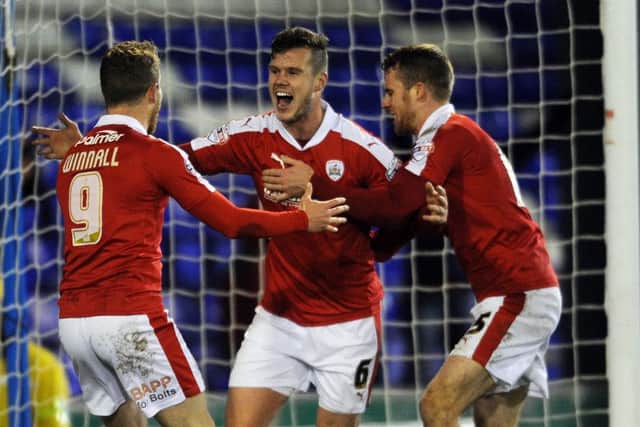On-loan 
Kevin Long, celebrates scoring the winner for Barnsley at Oldham. Picture: Steve Riding.