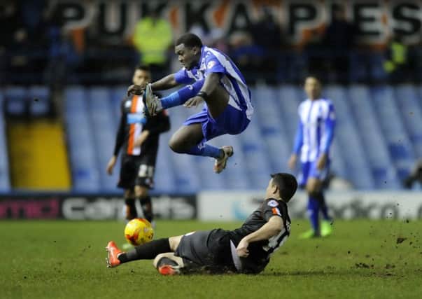 Sheffield Wednesday's Royston Drenthe jumps out of the way of Blackpool's Darren O'Dea's tackle on Boxing Day at Hillsborough last year.