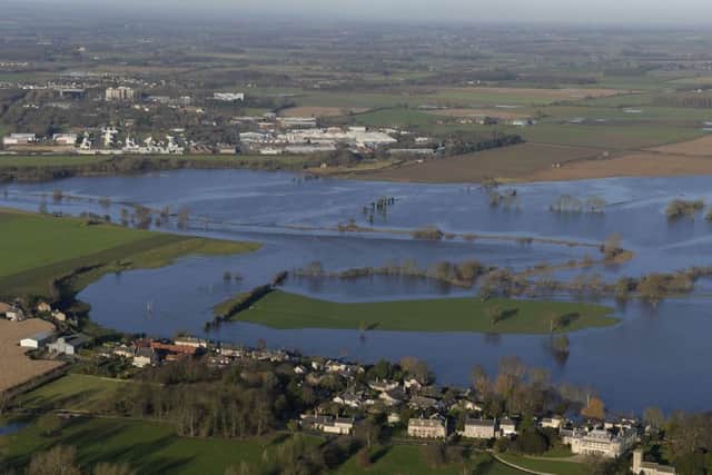 Floodwater covers land between Thorpe Arch Estate and Newton Kyme after the River Wharfe burst its banks. Joe Giddens/PA Wire