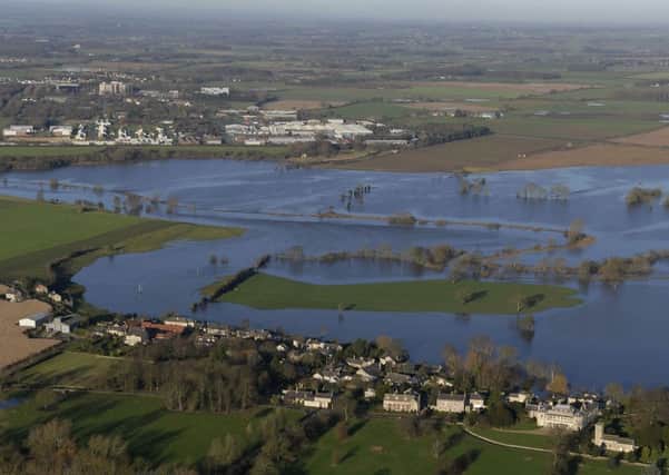 Floodwater covers land between Thorpe Arch Estate and Newton Kyme after the River Wharfe burst its banks. Joe Giddens/PA Wire