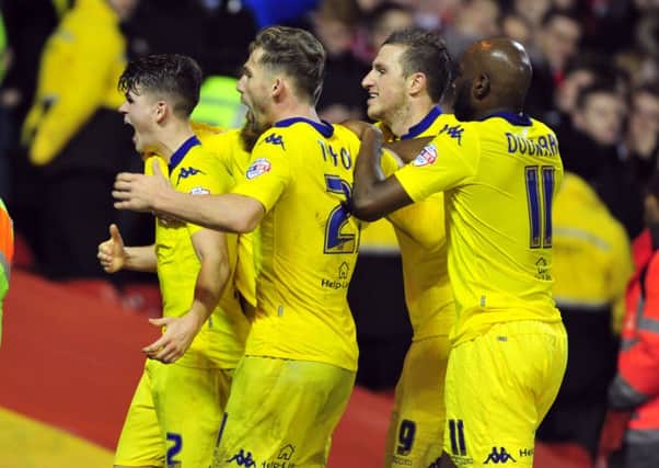 Leeds United players celebrate after Sam Byram, left, had equalised against Nottingham Forest (Picture: Tony Johnson).