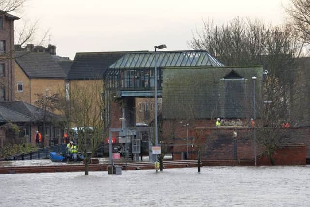 Engineers and army personnel work to repair the River Foss barrier in York.  Picture: Anna Gowthorpe/PA Wire
