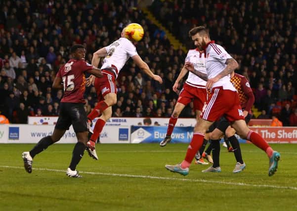 Sheffield Uniteds David Edgar scores his side's third goal against Bradford City. Picture: Sport Image.