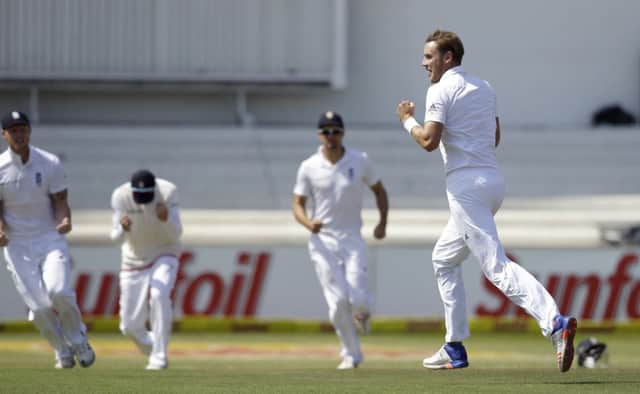 Englands bowler Stuart Broad, right, celebrates with teammates after bowling South Africas batsman Temba Bavuma, for 10 runs, on the third day in Durban. AP/Themba Hadebe.