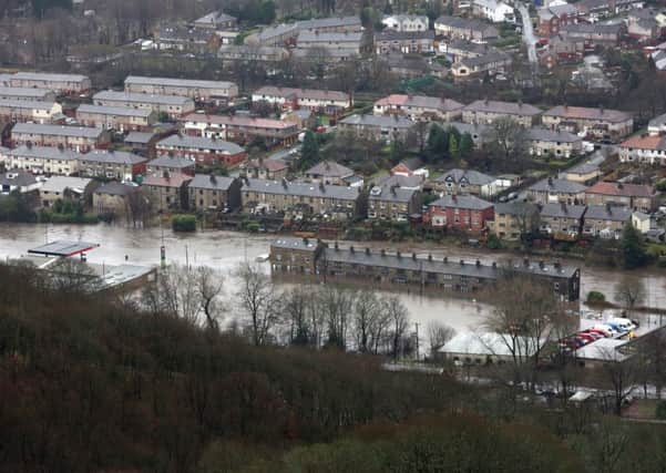 Mytholmroyd centre under water after the River Calder burst in banks.