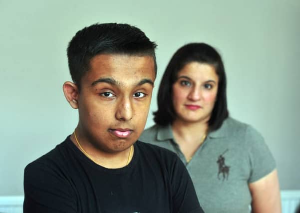 Akash Suryavansi, from Harehills, with his mum Tina. Picture by Tony Johnson.