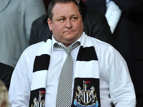 Mike Ashley pledges pay rise for staff