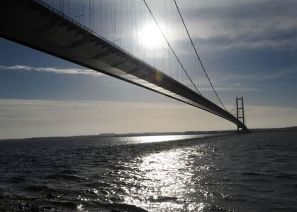 The autumn sunshine shines off the Humber Estuary underneath the Humber Bridge near Hull. (Picture: Anna Gowthorpe/PA Wire)