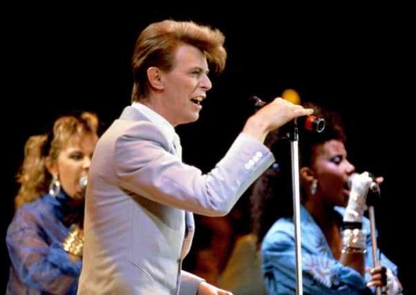 File photo dated 13/07/85 of David Bowie performing at Live Aid