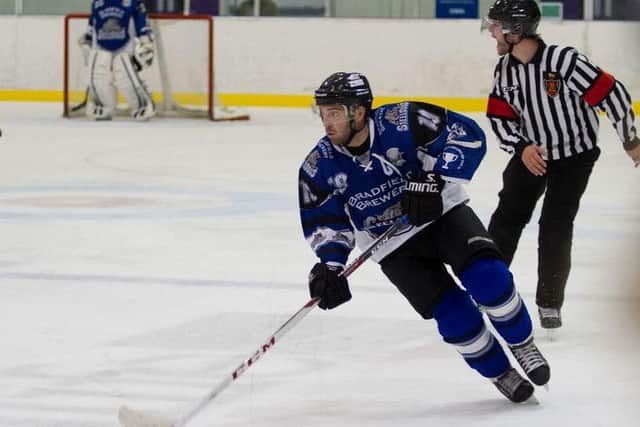 Sheffield Steeldogs' player-coach Greg Wood oversaw an overdue win at Telford Tigers.