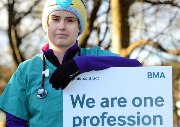 A&E doctor Elizabeth Morris on the picket line at the Northern General Hospital in Sheffield. Picture: Scott Merrylees