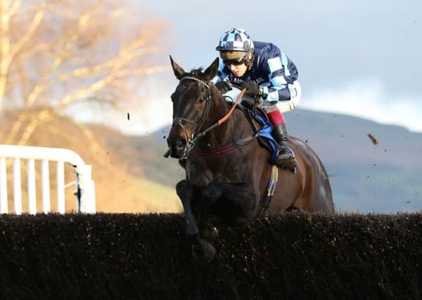 Richard Johnson on his way to his 3,000th winner aboard Garde La Victoire at Ludlow yesterday (Picture: Simon Cooper/PA Wire).