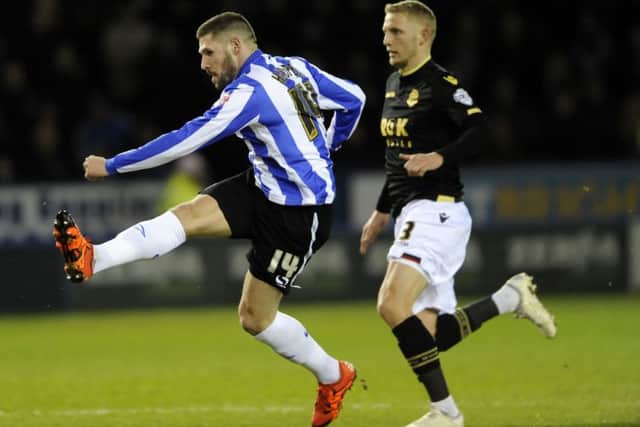 WANTED MAN: Two-goal hero Gary Hooper lets loose against Ipswich Town in the penultimate game of his loan spell. The Owls want to keep the Norwich striker. Picture: Steve Ellis.