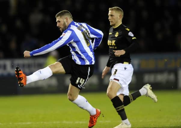 WANTED MAN: Two-goal hero Gary Hooper lets loose against Ipswich Town in the penultimate game of his loan spell. The Owls want to keep the Norwich striker. Picture: Steve Ellis.