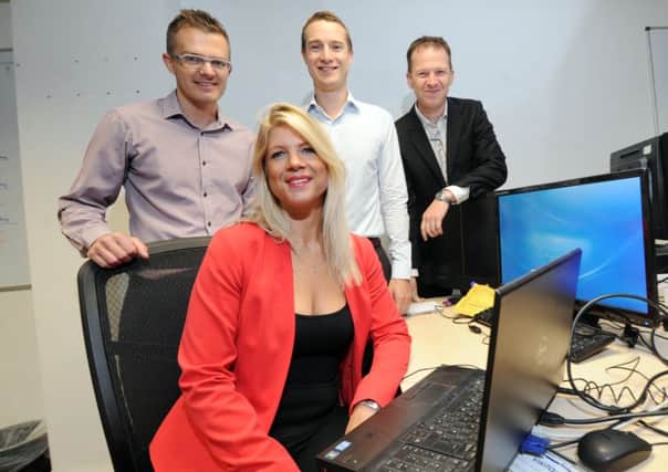 Leeds based IT firm BJSS, Coronet House, Leeds...Pictured from the left are Mark Goldthorpe, Dave Shipp, Mike Buck and Cassy Calvert..SH1001881b 15th September 2014 Picture by Simon Hulme
