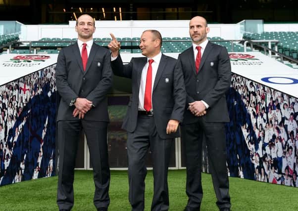 England head coach Eddie Jones (centre) with coaches Steve Borthwick (left) and Paul Gustard (right) at Twickenham on Wednesday. Picture: Andrew Matthews/PA.