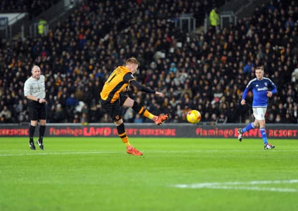 Hull City's Sam Clucus fires home his side's second goal. Picture: Tony Johnson