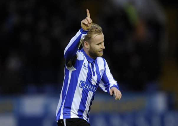 Barry Bannan is a happy man at Sheffield Wednesday.